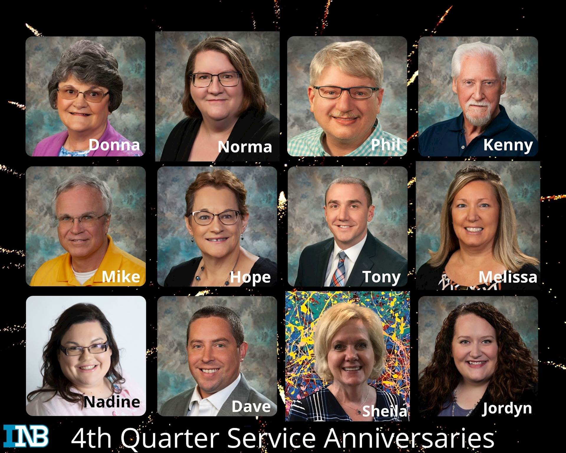 12 people celebrating service anniversaries